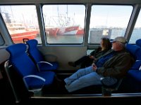1008280152 ma nb NantucketFerry  Passengers take in the sites of New Bedford's waterfront as they take the maiden voyage of the Seastreak Whaling City Express ferry service from New Bedford to Nantucket.   PETER PEREIRA/THE STANDARD-TIMES/SCMG : ferry, waterfront, voyage, trip, harbor